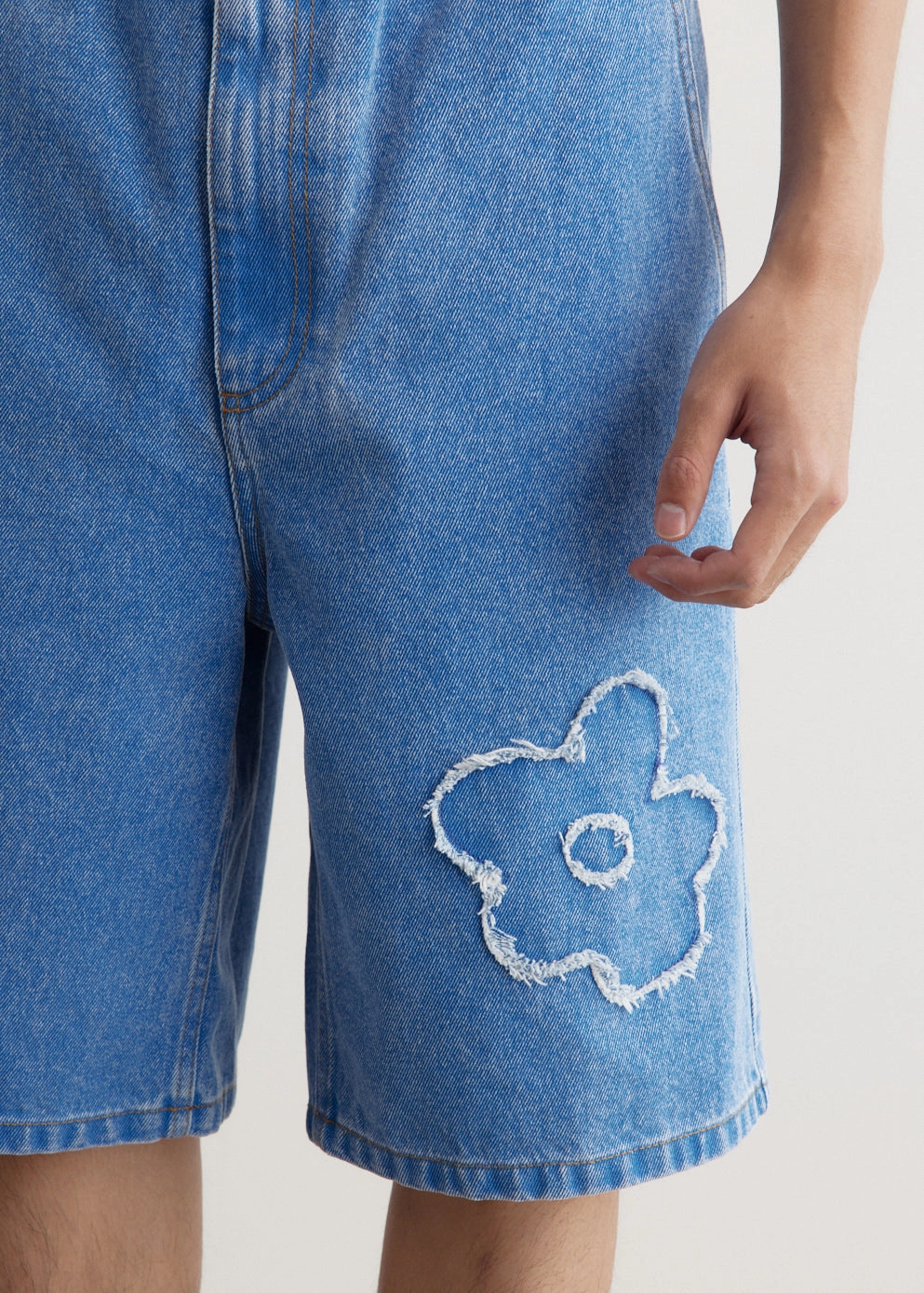 Flexible Fabric Flower Patch Bleached Denim Shorts