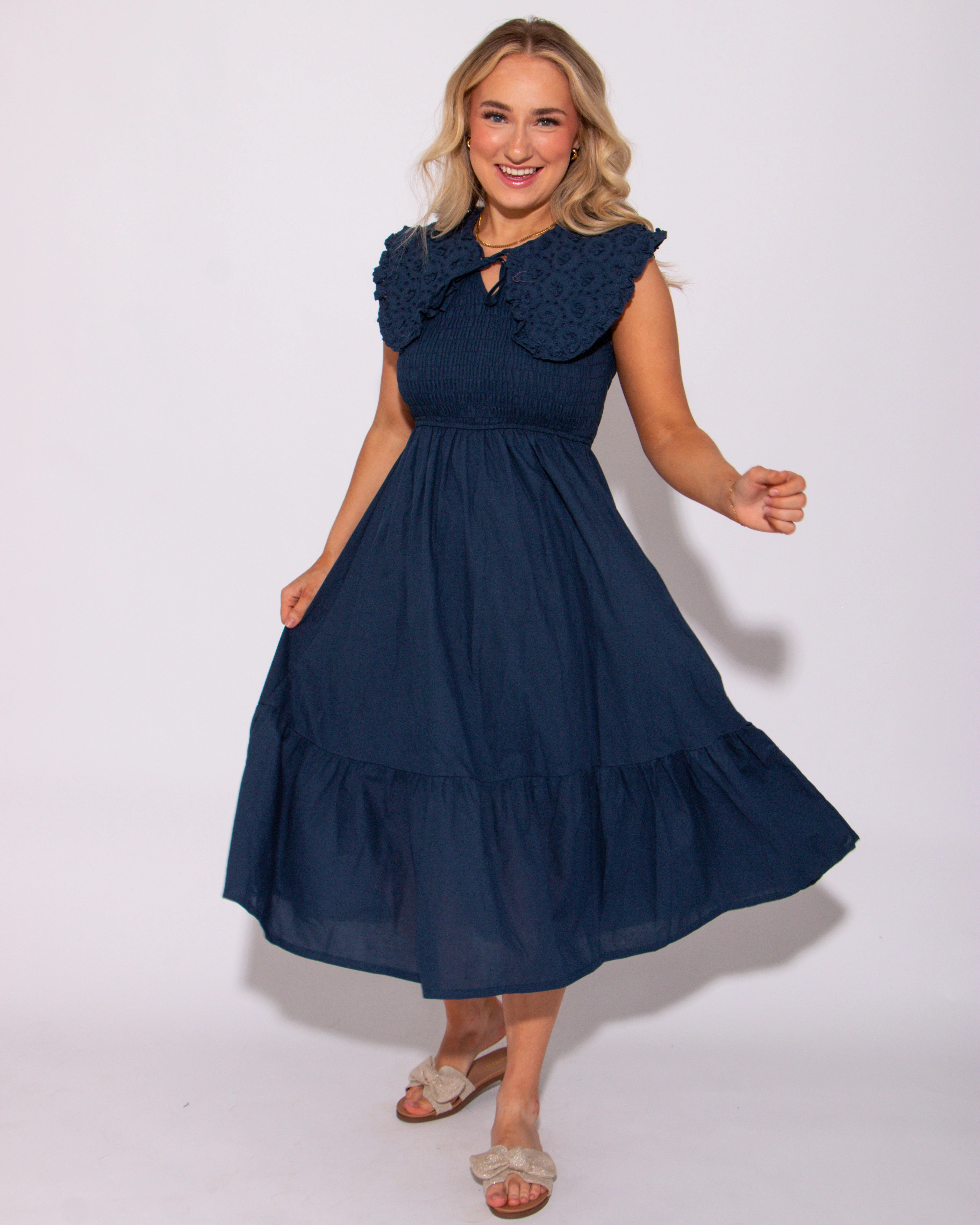 Minimal Cut Smart and Sleek Navy Lace Embroidered Smocked Midi Dress