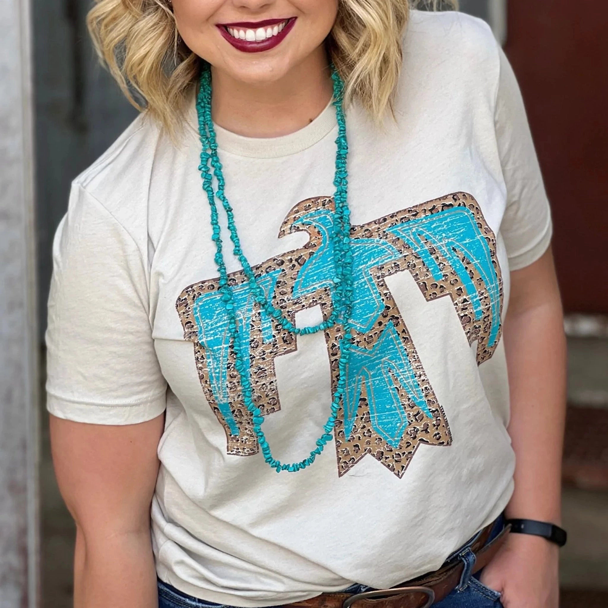 Texas True Ladies Cassie Thunderbird Tee-Leopard/Cream/Turquoise Roll Up Sleeve Design RawHemDetail