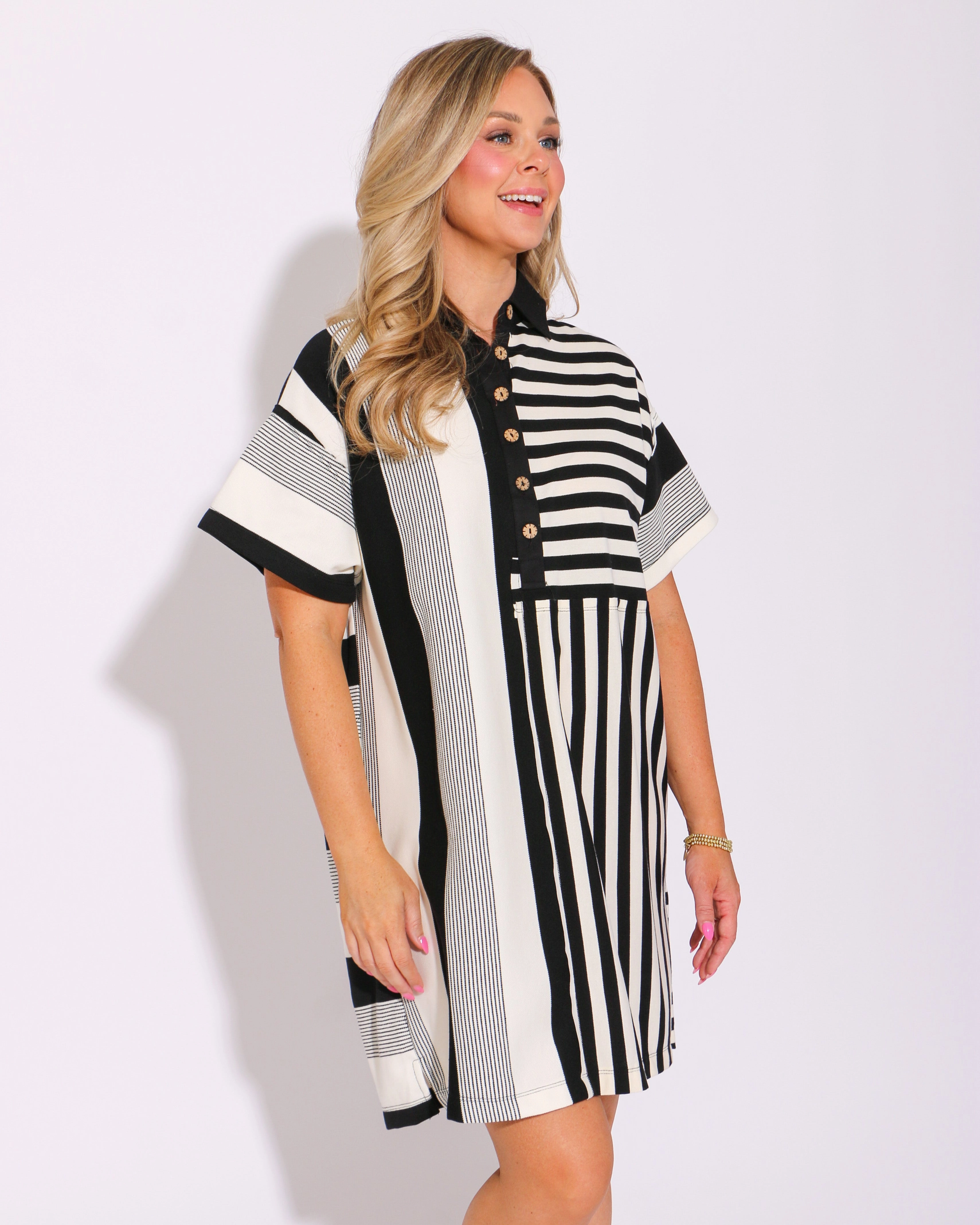 The Mixed Line Mini Dress in Black retro-style